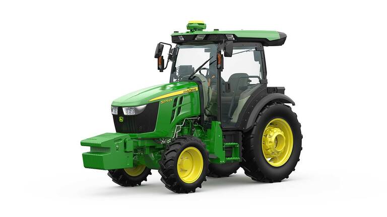 John Deere 5075EN traktor zöld és sárga színben, elölnézet kompakt kialakítással és masszív gumiabroncsokkal.